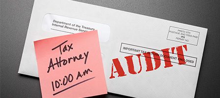 Envelope marked audit with appointment note