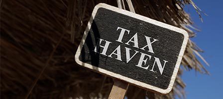 Rustic tax haven sign outdoors
