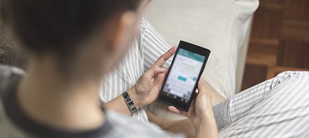 Relaxed individual texting on mobile device