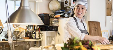 Happy chef in a restaurant kitchen