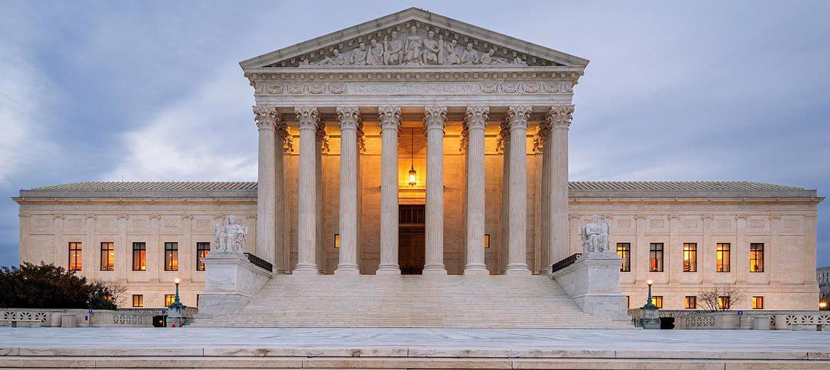 Supreme Court building at dusk