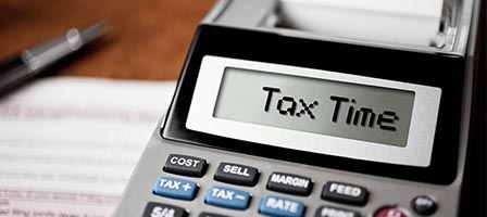 Tax season calculator on desk
