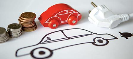 Toy car with coins and power plug