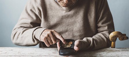 Older adult managing finances at home