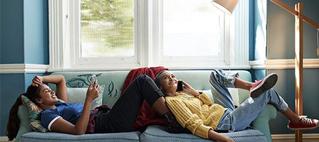 Friends relaxing on a couch
