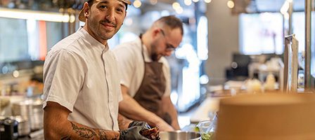 Professional chefs working in restaurant kitchen