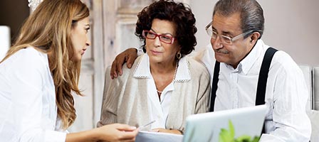 Couple consulting with a financial advisor