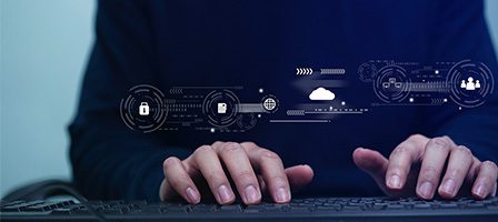 Digital technology symbols above typing hands