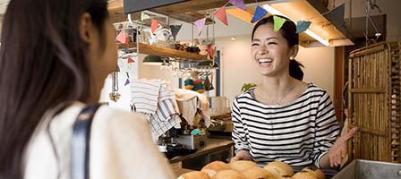 Friendly bakery interaction with customer