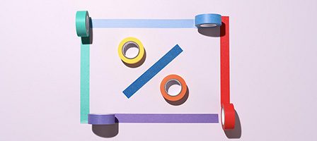 Creative percentage sign with tape rolls