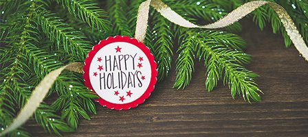 Festive ribbon and holiday message