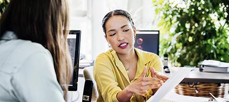 Office meeting with two colleagues