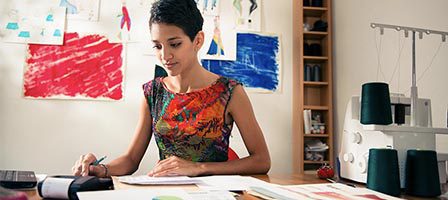 Artist creating designs in a workspace