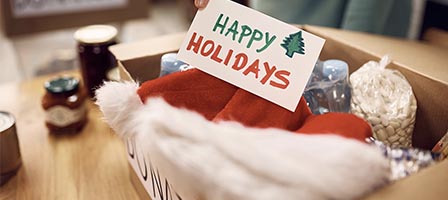 Festive donation box and holiday greeting