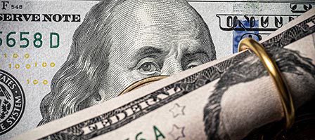 Close-up of rolled dollar bills