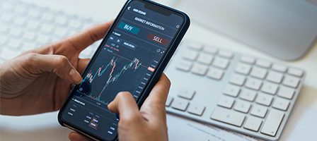 Trading app on smartphone screen