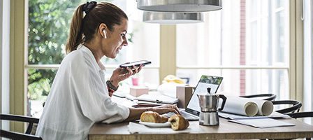 Woman working from home with laptop