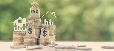 Financial growth concept with currency and homes