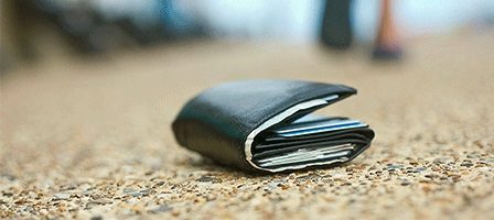 Wallet lying on pavement