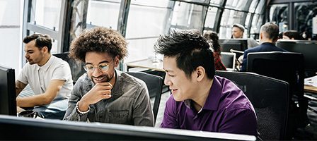 Teamwork in a bright, open workspace