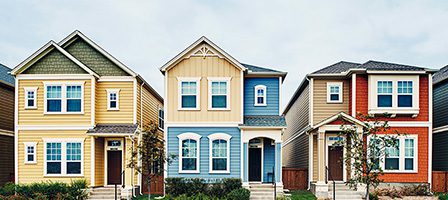 Row of colorful, modern suburban homes