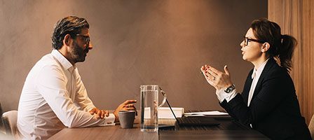 Business meeting discussion between two professionals