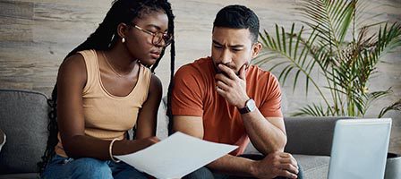 Couple reviewing documents together