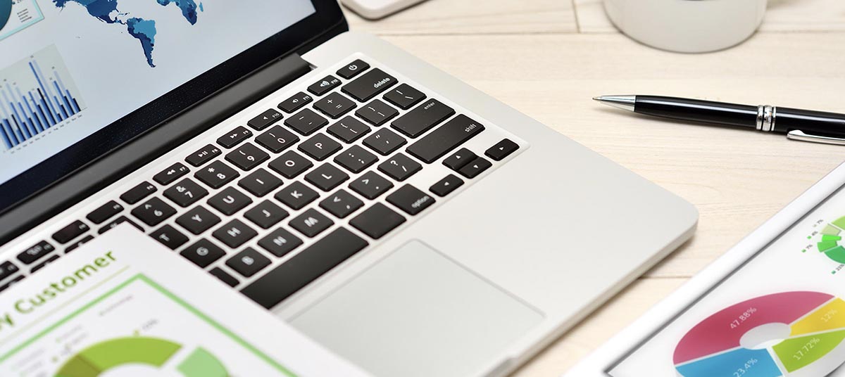 Laptop with charts and graphs