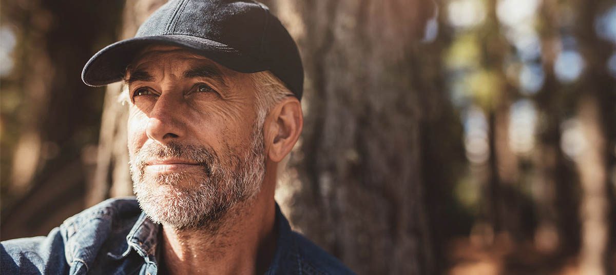 Man in cap outdoors