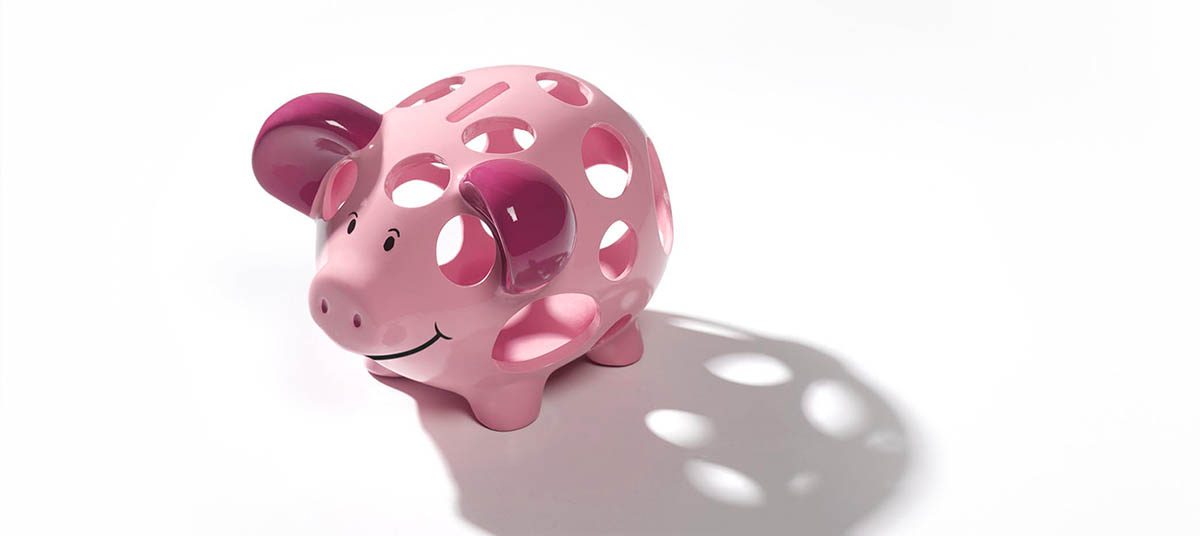 Decorative pink pig with circular cutouts