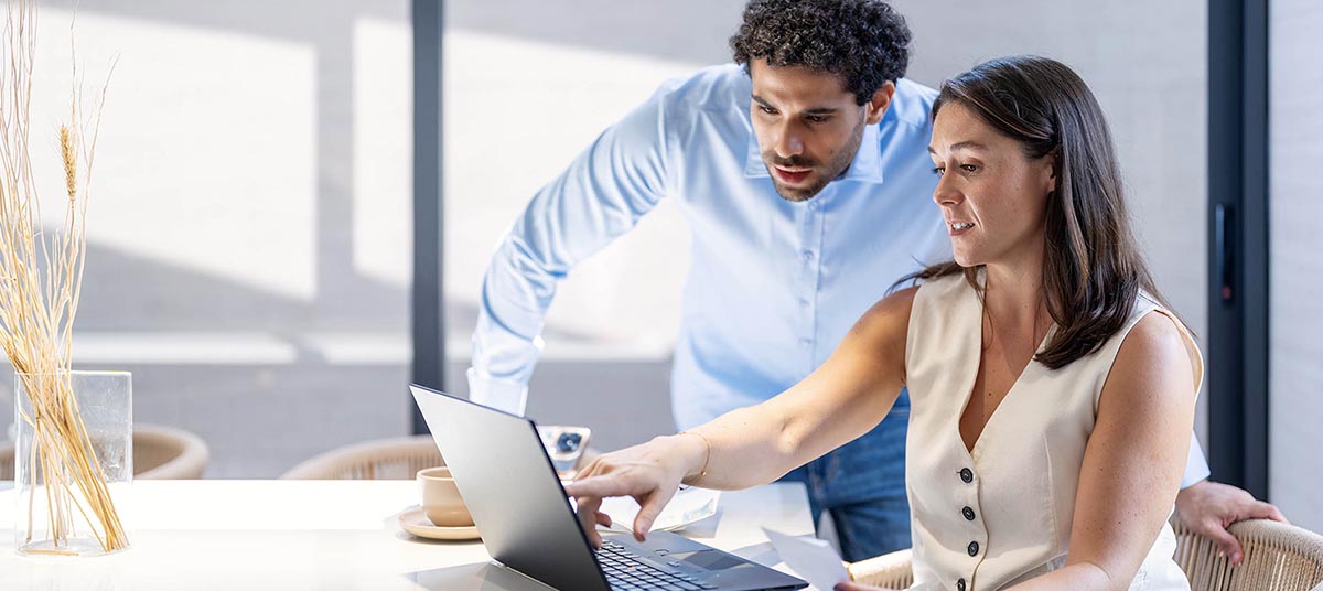Business professionals reviewing project together