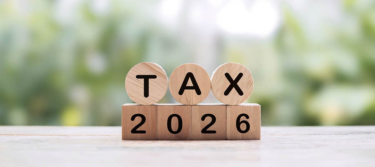 Wooden blocks spelling Tax 2026