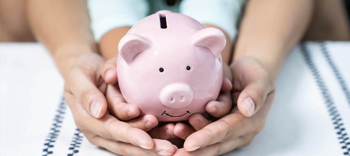 Saving money concept with piggy bank