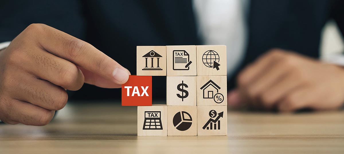 Tax planning concept with wooden blocks