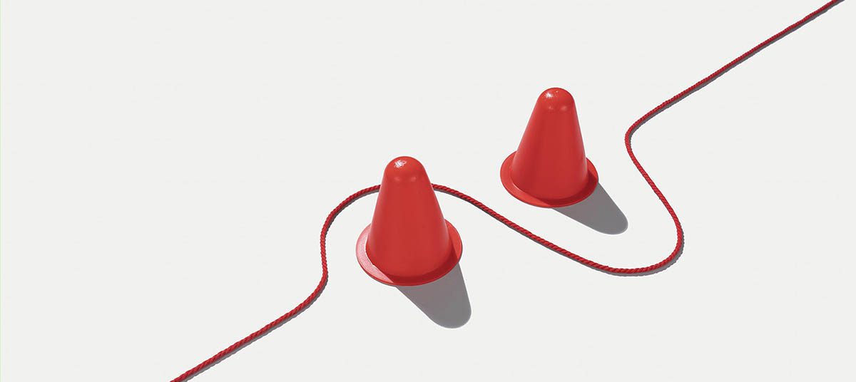 Two cones connected by red string