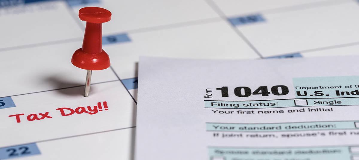 Form 1040 next to calendar