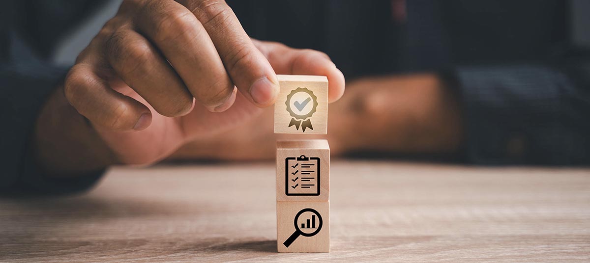 Wooden blocks with business symbols
