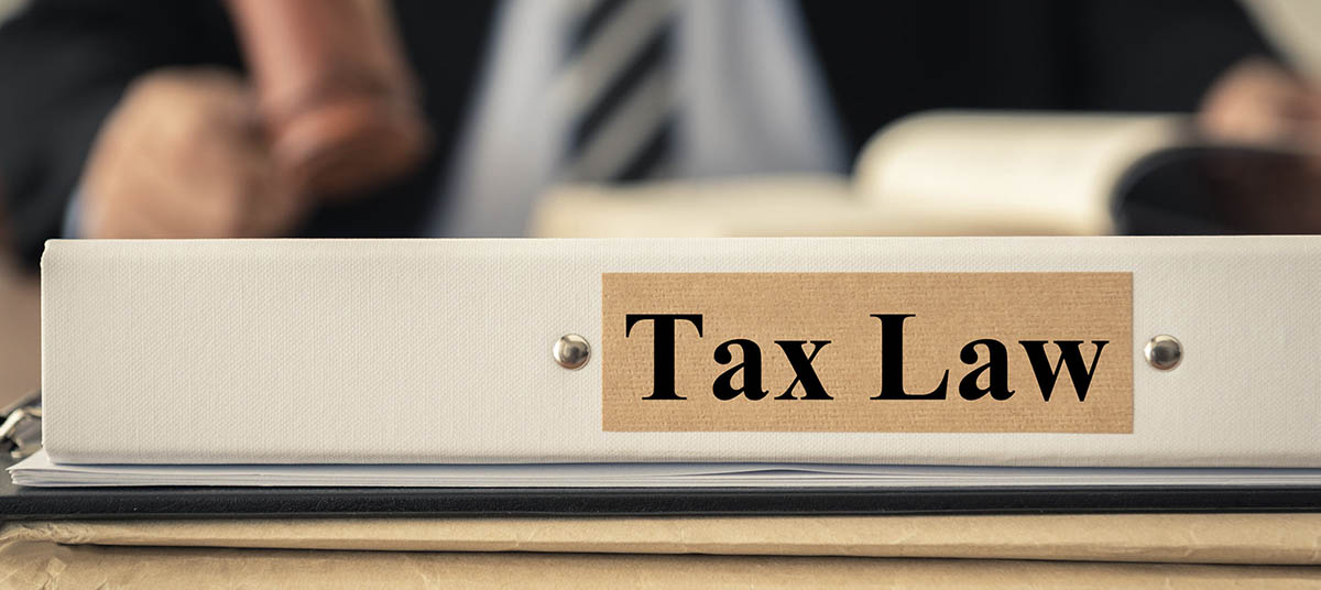 Legal professional reviewing tax documents