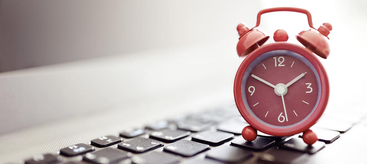 Time management concept with alarm clock
