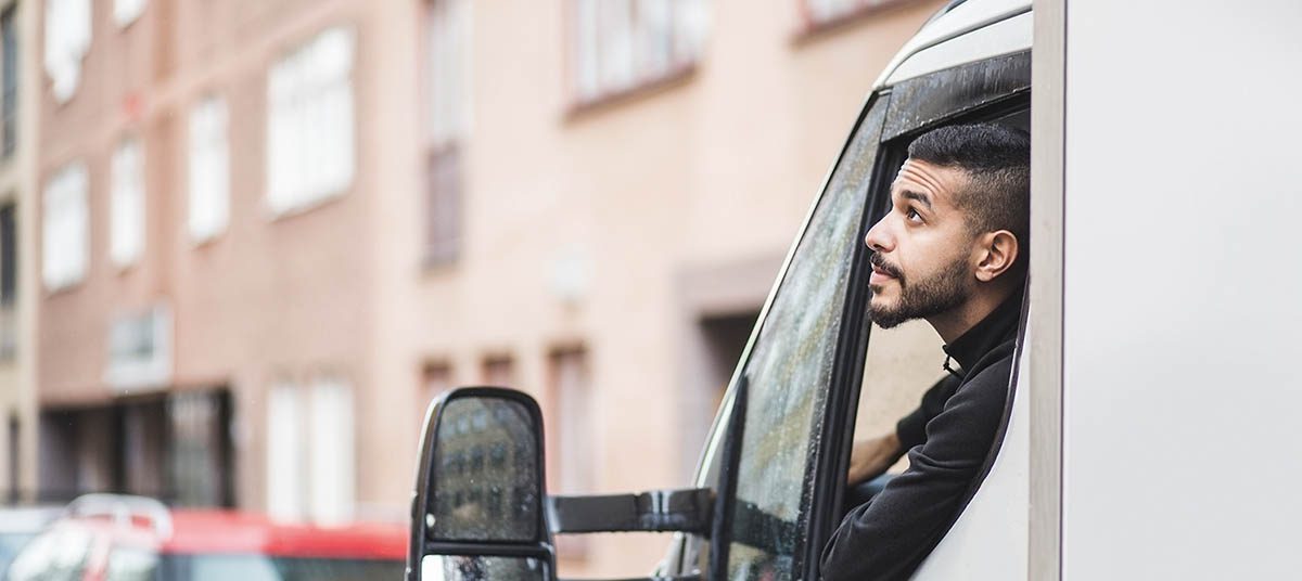 Driver looking out truck window