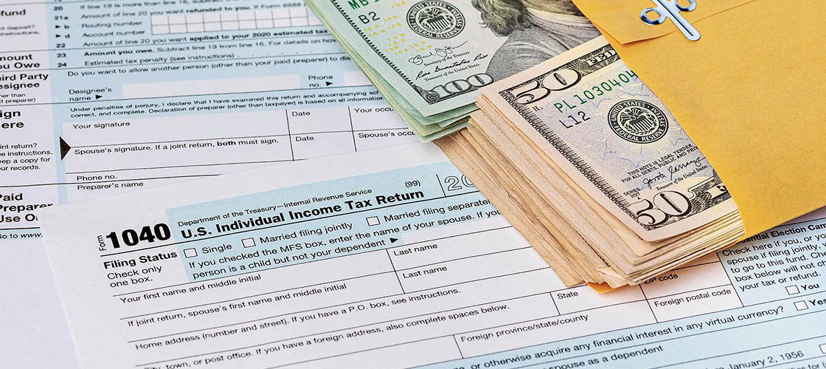 Income tax paperwork and money