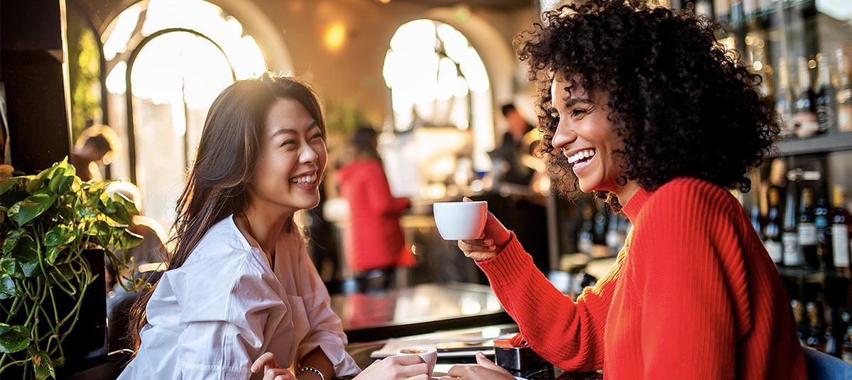 Women enjoying coffee at a cafe