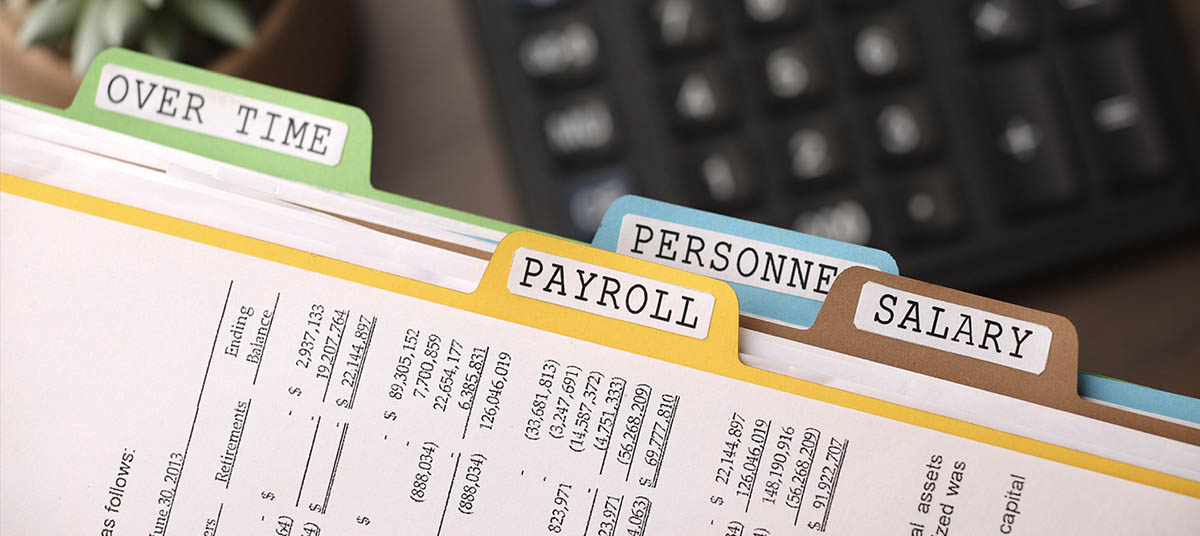 Financial documents labeled with tabs