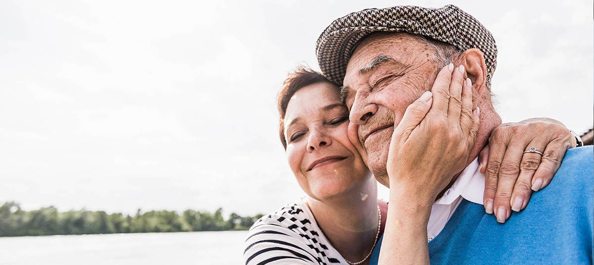 Loving embrace of an elderly couple