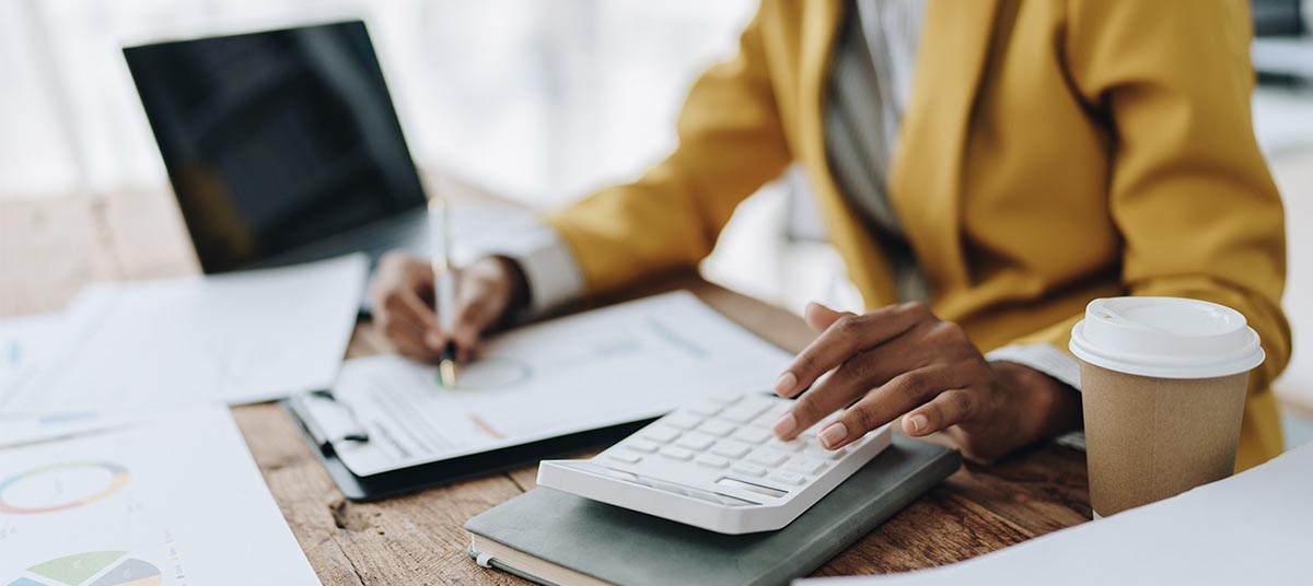 Professional analyzing financial data at desk