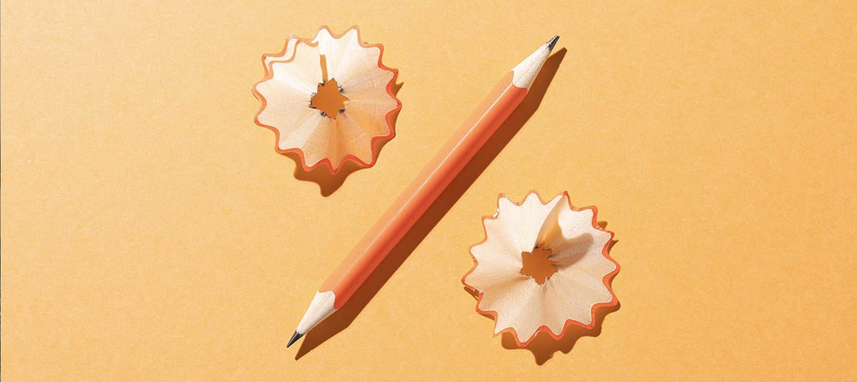 Pencil and shavings form a percentage symbol