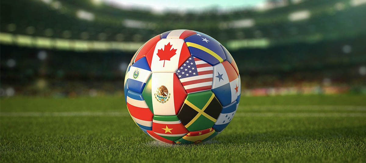 Multinational flag soccer ball in stadium