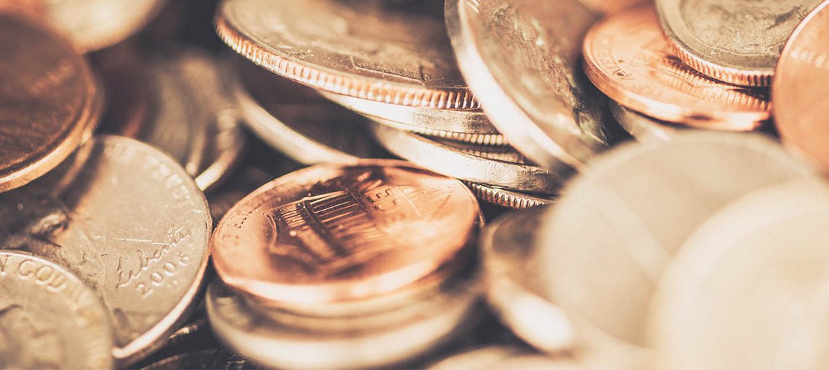 Close-up of scattered coins