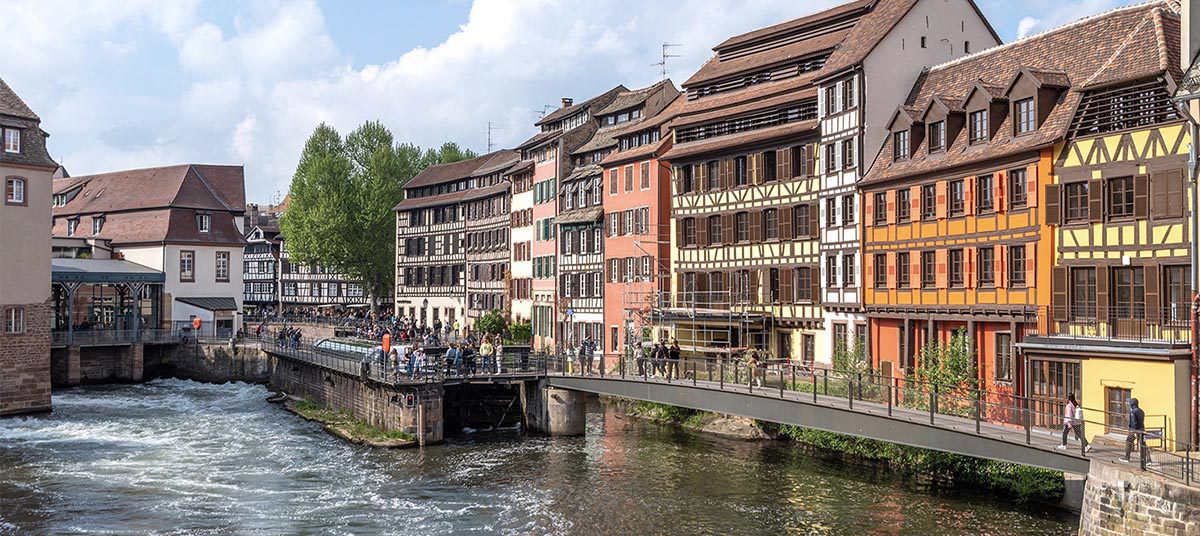 Historic European architecture along the river