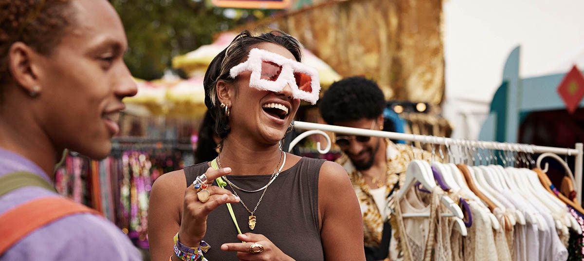 Woman laughing with unique sunglasses